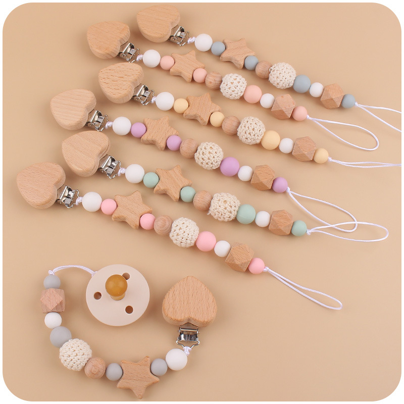 Nuevo bebé suministros de dibujos animados melocotón corazón chupete cadena chupete mordedura chupete cadena anti-gota conjunto de dos piezas