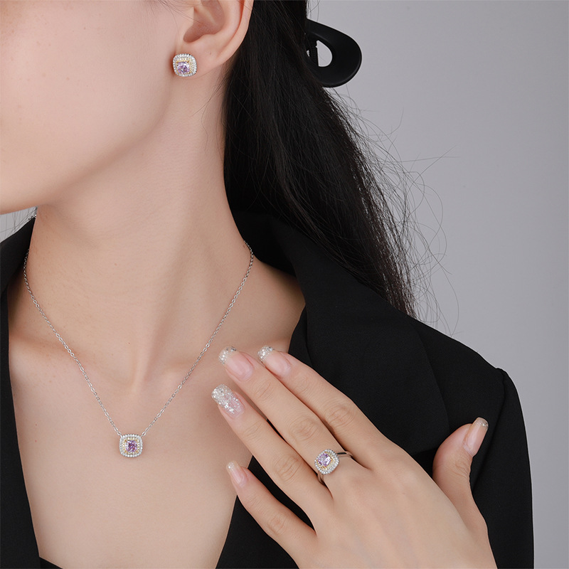 Otoño e invierno nuevo estilo Zhuangsheng conjunto de joyas con alto contenido de carbono diamante hielo flor de cobre cortado con incrustaciones de diamantes morados piedra principal 6*6