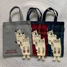 出口日本新款刺绣猫咪手提包补习包IPAD包手拎包逛街购物包