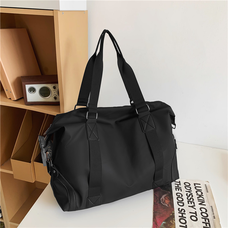 Nuevo bolso de viaje de color sólido, bolso de yoga de mano de gran capacidad, bolso de ocio, bolso de ejercicio, bolso de viaje corto.