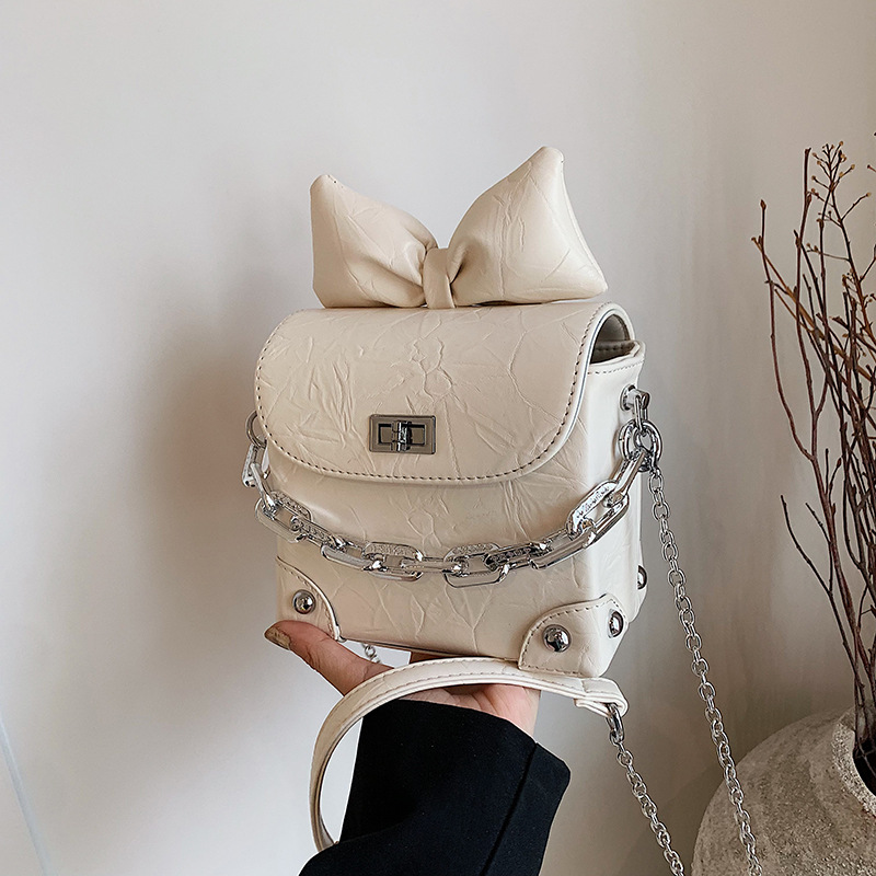 Bolso de mochila este año popular mini bolso de mujer nuevo arco de color sólido cadena bolso de mano bolso de hombro