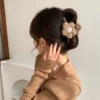 Кофейный с цветком (≈11 см)