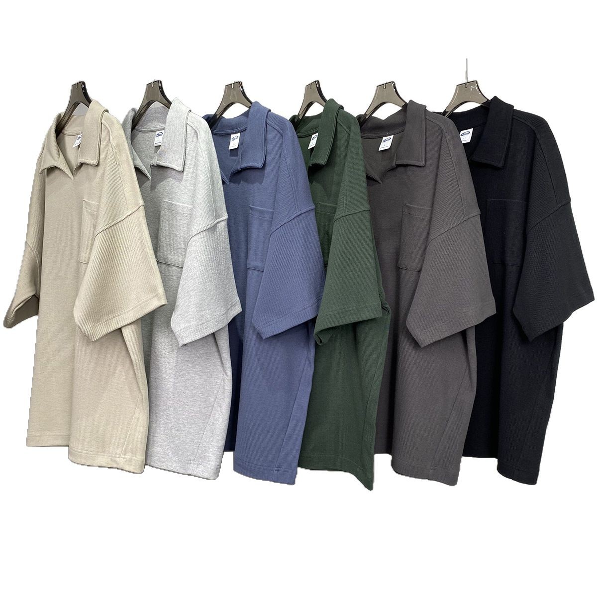 Camiseta de manga corta para hombre, estilo waffle transpirable, talla grande, estilo europeo y americano, holgada, con cuello tipo solapa, moda urbana 2025.