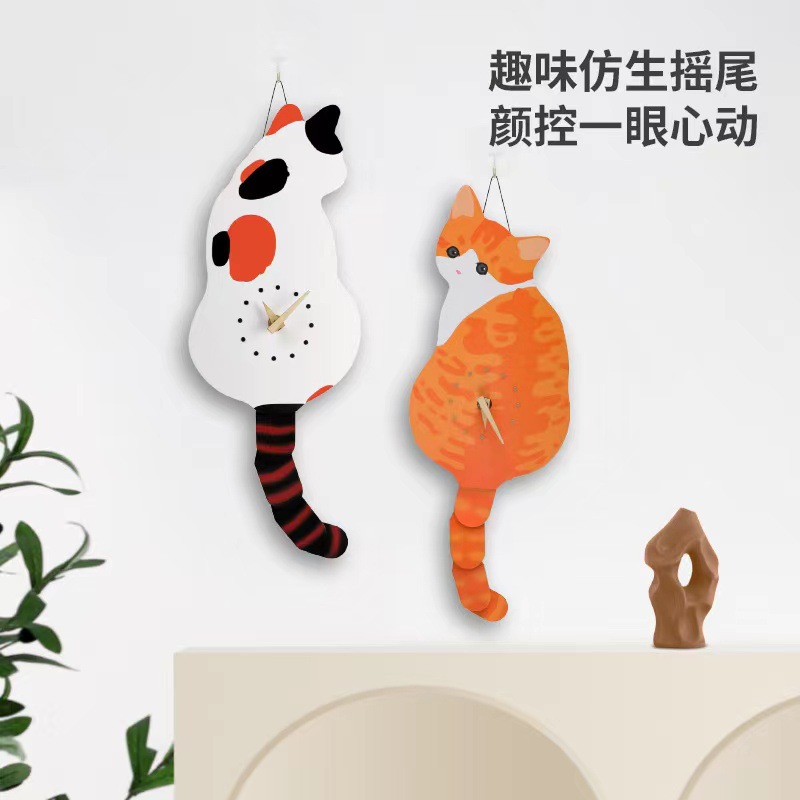 震え音が同じ揺れ尾猫掛け時計寝室掛け時計かわいいクリエイティブ猫時計はクリスマス元日の旧正月に備えている