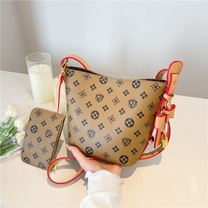 Bolso de cubo retro estilo Hong Kong 2025 verano nuevo bolso femenino personalidad bowknot bandolera moda contraste color bandolera
