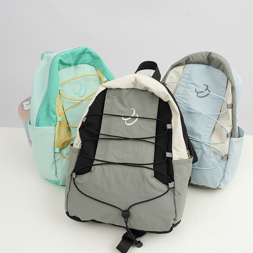 New Japanese niche color matching backpack for women 2024 new sports travel backpack middle and high school student school bag trend