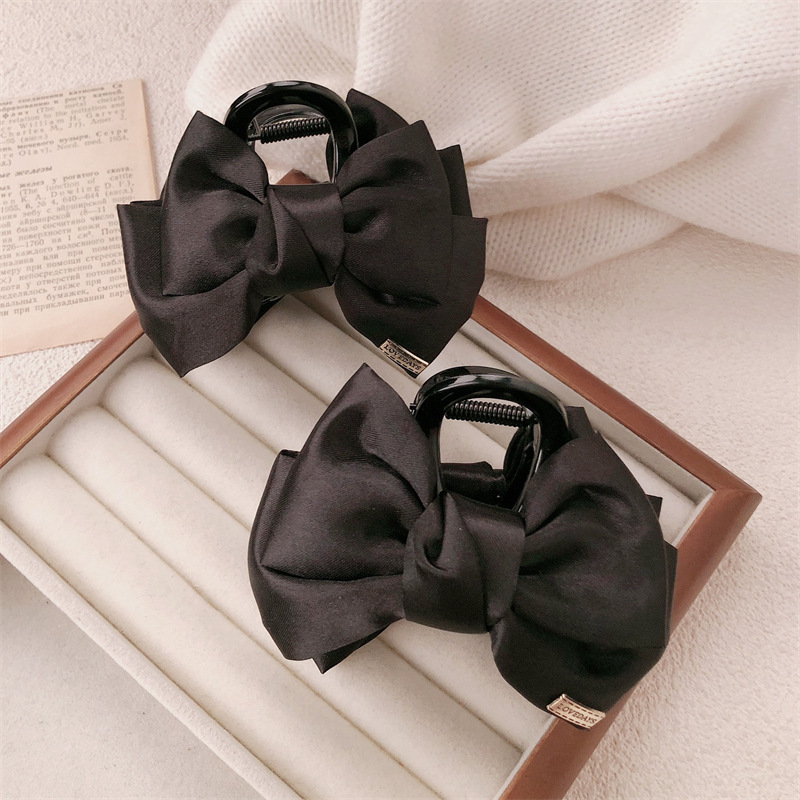 Oro negro etiqueta abrazadera de arco para mujeres nuevo estilo de alta sensibilidad abrazadera de cabello detrás del cerebro abrazadera de cabello de pesca abrazadera de cabello