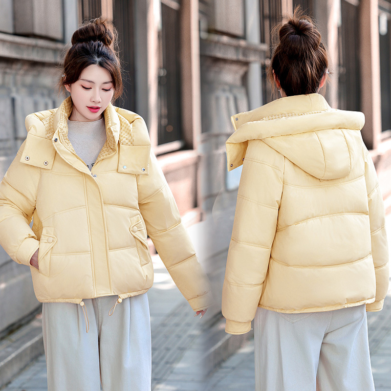 Sombrero desmontable ropa de algodón corta de invierno de mujeres 2025 nuevo algodón ropa de algodón gruesa calentamiento chaqueta de algodón de moda coreana de mujer