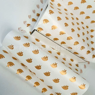 30g加厚雪梨纸 服装包装纸logo印刷定制 玫瑰金色 图案 来样加工