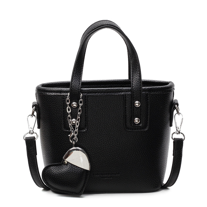 Bolso de cubo portátil transfronterizo simple y de alta gama para mujer 2025 nuevo bolso de hombro de estilo occidental de todo fósforo bolso de mensajero de moda