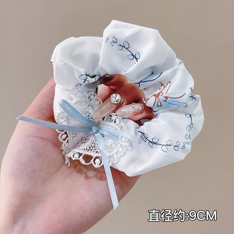 Anillo de pelo de intestino grueso súper grande coreano para mujer 2025 nuevo estilo de alta gama cordón de pelo de encaje plisado temperamento dulce cuerda de cabeza de flor