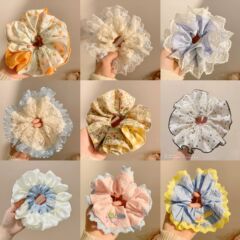 フランスレースの大腸シュシュの女性の高級感の大きいサイズの頭の花の甘い髪の縄は百合で髪の縄を傷つけません。