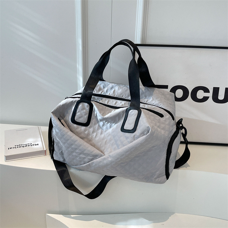 Bolso de mujer 2025 nuevo equipaje de viaje de gran capacidad, bolso de vacaciones de corta distancia de alta calidad.
