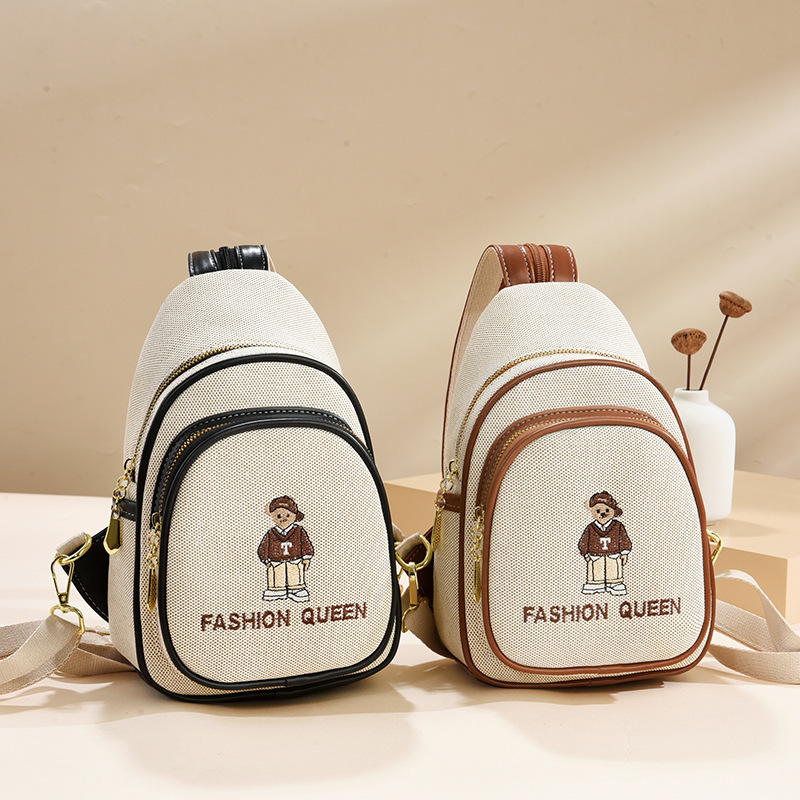 Mochila de dibujos animados 2025 nueva moda simple bolso de pecho casual mujer oso bordado bandolera de todo fósforo