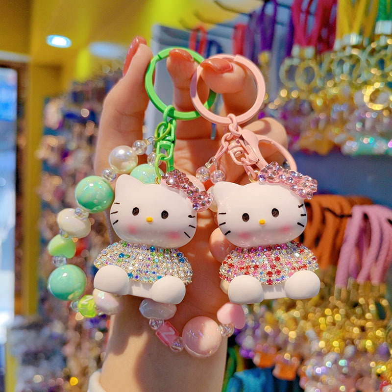 Korean version of cartoon diamond kt cat keychain cute ladies beaded bag key chain ring mobile phone pendant accessories wholesale