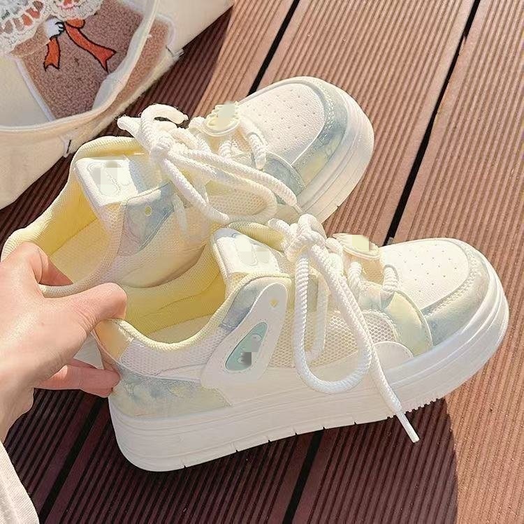 Zapatos de mujer de verano zapatos blancos 2026 nuevo nicho de malla transpirable zapatos de pan de suela gruesa zapatos de skate de moda para mujeres