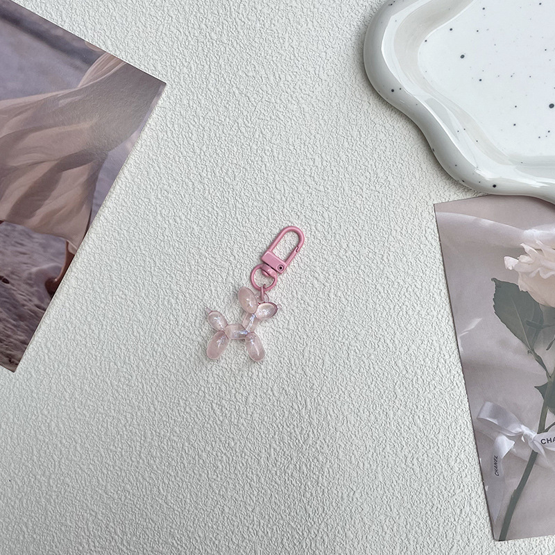 Pequeño Libro Rojo mismo lindo jalea globo láser perro llavero colgante colorido cachorro de dibujos animados teléfono llavero