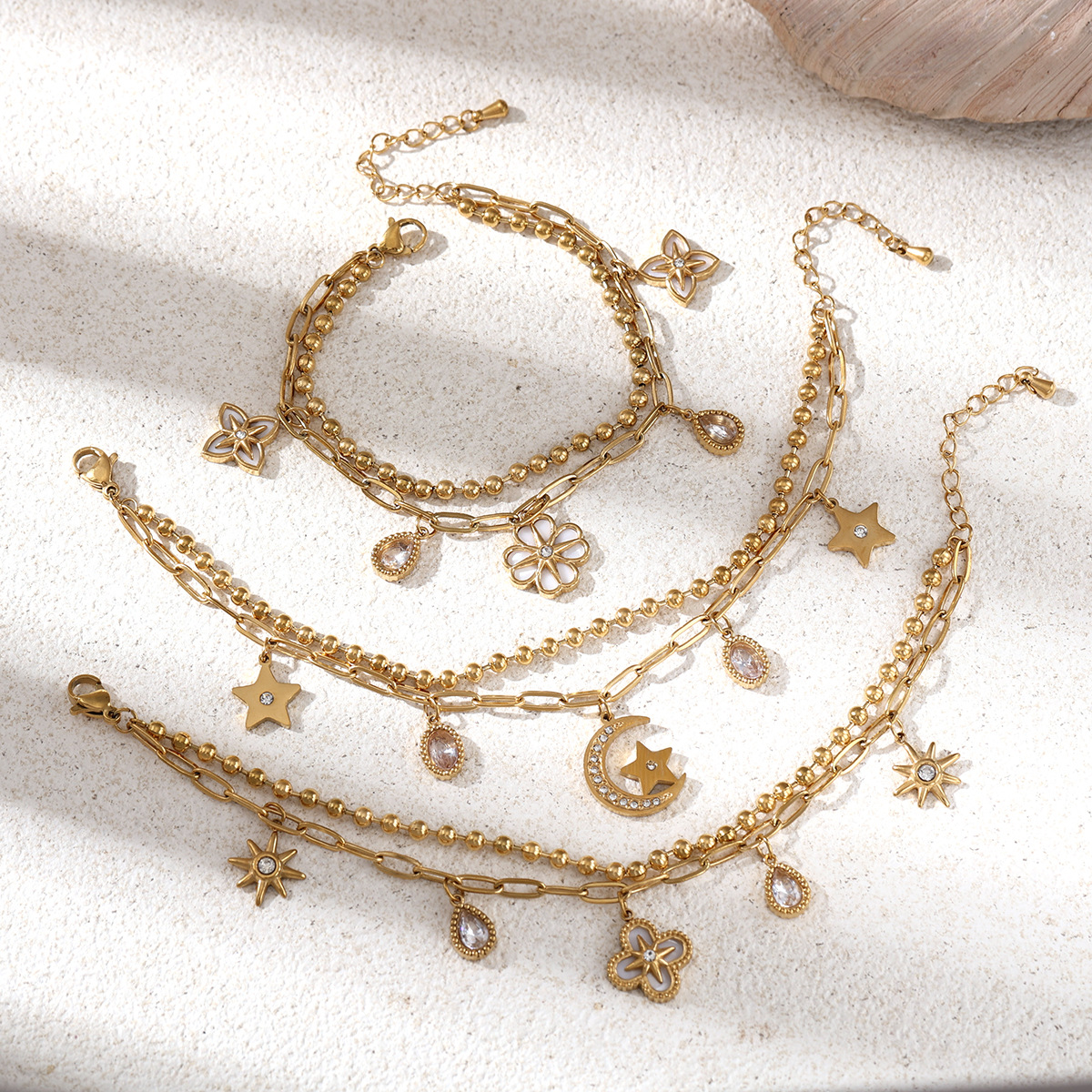 Tina Europa y América pulsera de acero inoxidable lujo ligero nicho universal personalidad tendencia flores más colgantes pulsera de piedra caliente