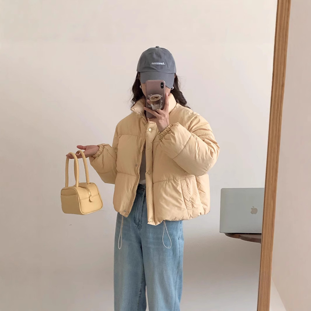 2025 ropa de algodón femenina ultra corta otoño invierno nuevo pequeño engrosado estilo coreano suelto ropa de pan de algodón chaqueta de algodón