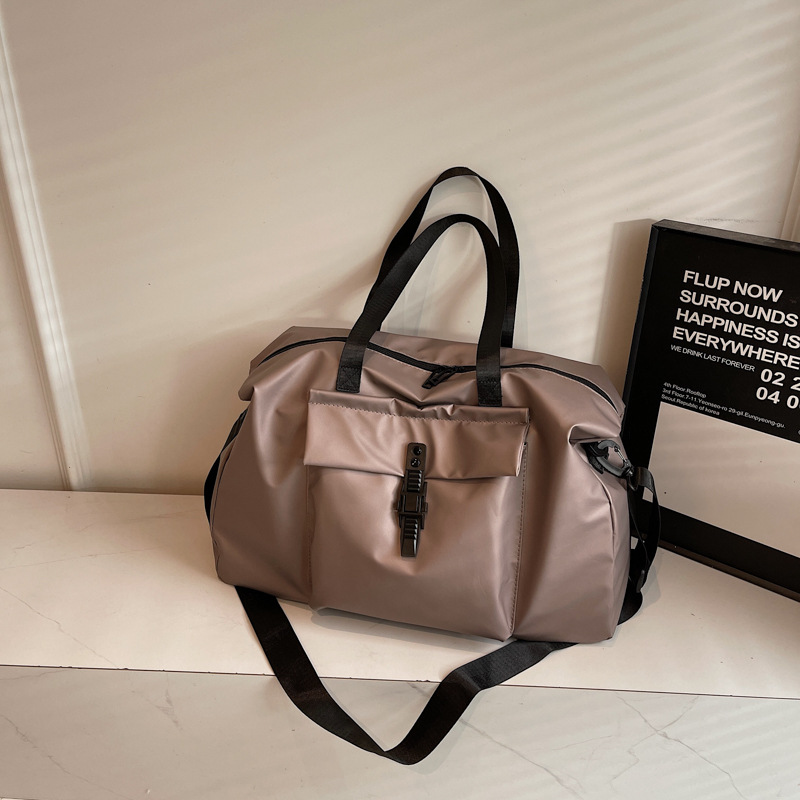 Bolsa de viaje transfronteriza de gran capacidad para mujeres nueva bolsa de almacenamiento portátil deportivo de acondicionamiento físico bolsa de viaje de negocios