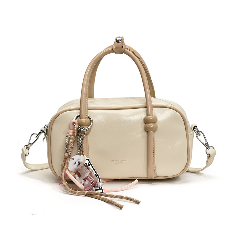 Colores contrastantes de tendencia universal bolso de bolos de mano mujer 2025 nuevo estilo de alto nivel de moda casual mochila de hombro