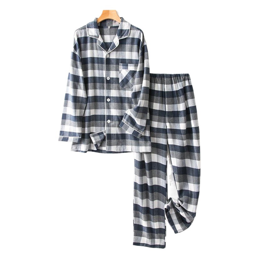 秋冬の男女のカップルの無印の紋様の純綿は毛の双股の絨毛のパジャマのスーツの部屋の服のスーツを磨いて卸売りします。