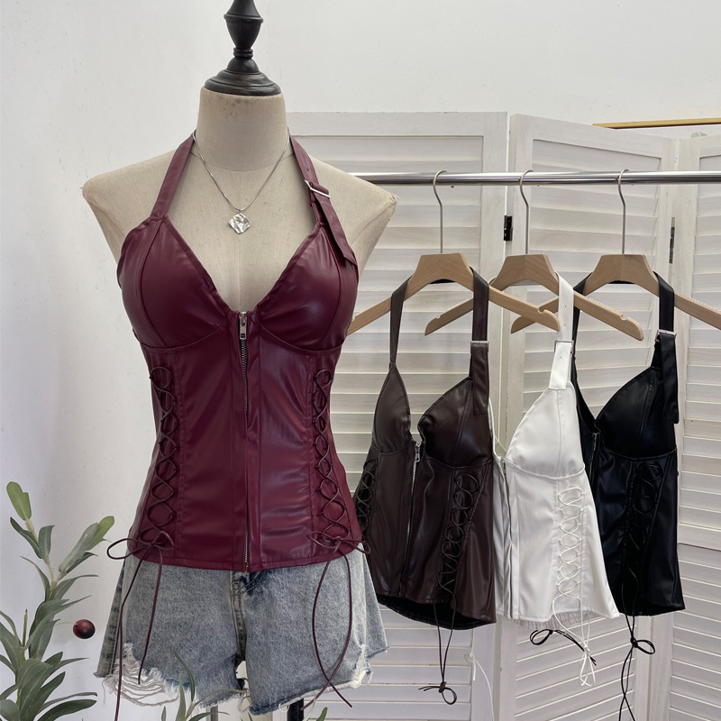 Real shot: Halter neck PU leather camisole with chest pads, waist tie, front zipper, and open back top 2896 Real shot: Halter neck PU leather camisole with chest pads, waist tie, front zipper, and open back top 2896