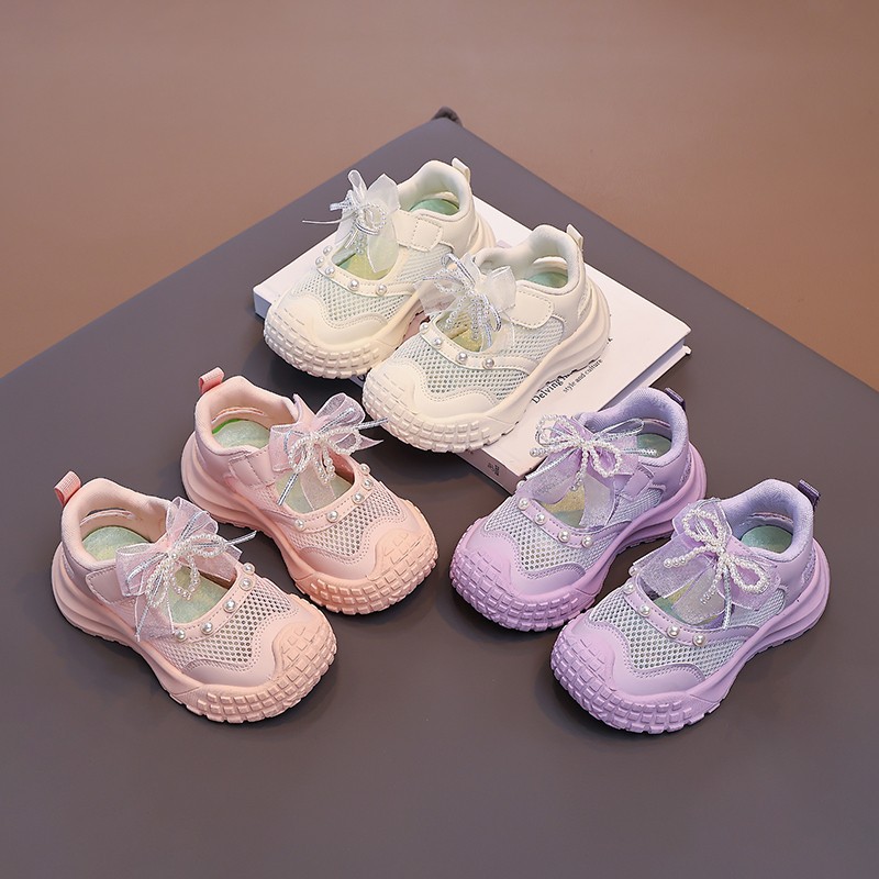 Sandálias de niñas verano 2026 nuevos zapatos de princesa suave para niños zapatos de cabeza grande zapatillas frías de niñas huecas zapatos