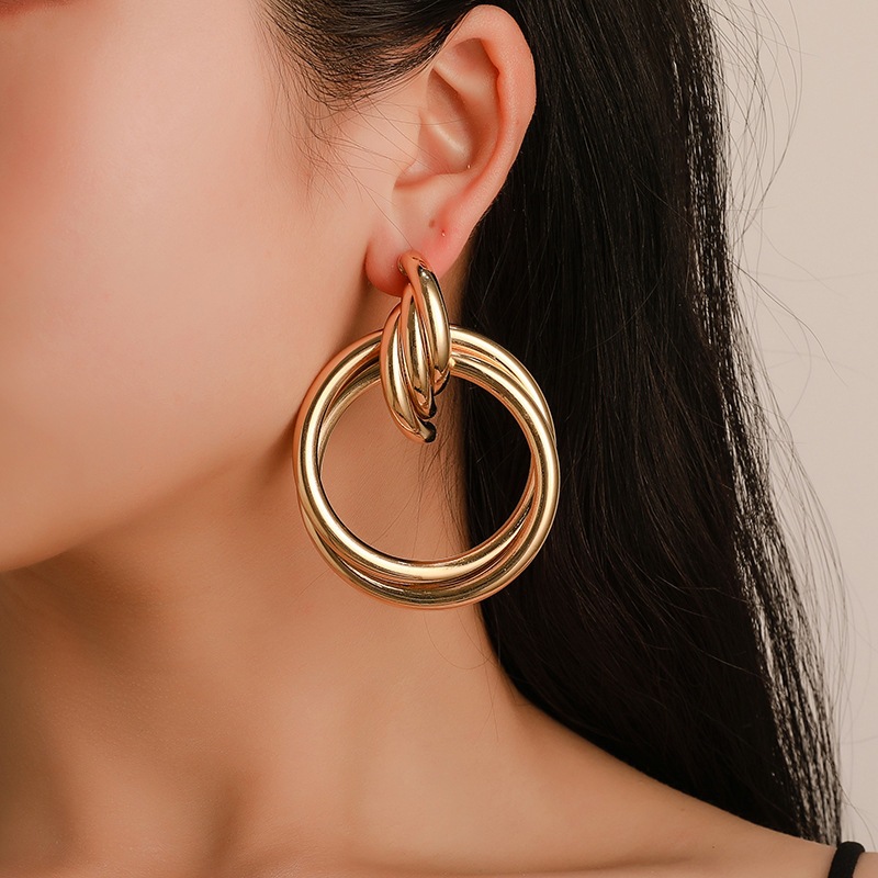 Exaggerated Metal Knotted Twist Geometric Round Creative Earrings display picture 3