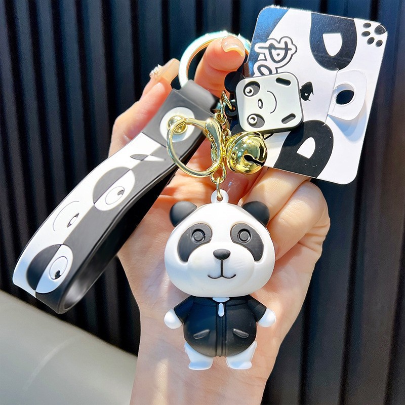 Keychain dinosaurio auténtico lindo bolso colgante de goma blanda llavero de automóvil muñeca pequeña máquina de regalos al por mayor image 9