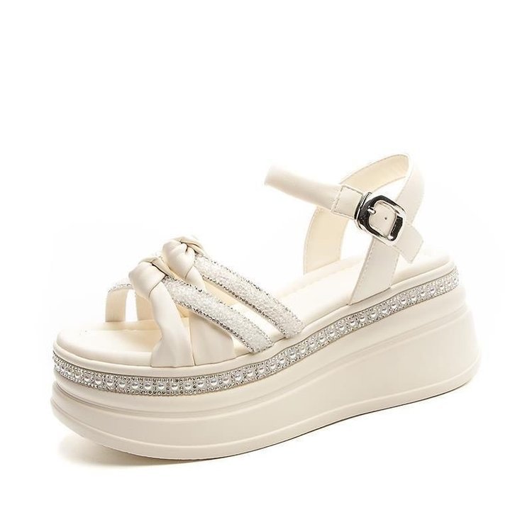 Romano graso aumento de altura sandalias para mujeres verano 2026 nuevo estilo retro exterior coreano versátil ocio mujer de playa