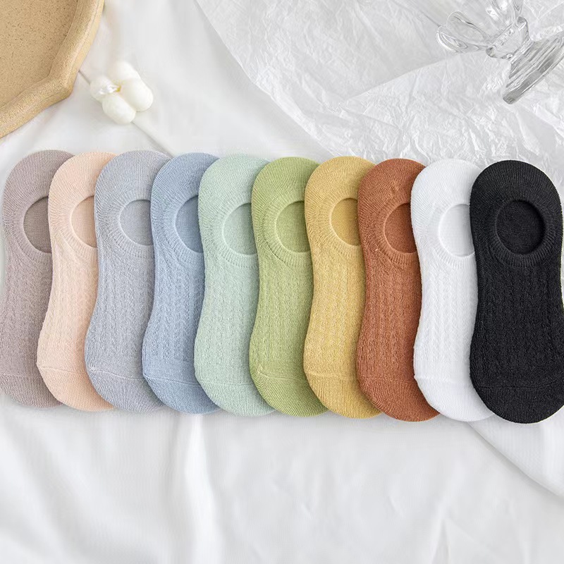 Calcetines de mujer primavera y verano hueco boca baja calcetines invisibles silicona antideslizante malla fina aire acondicionado calcetines barco al por mayor