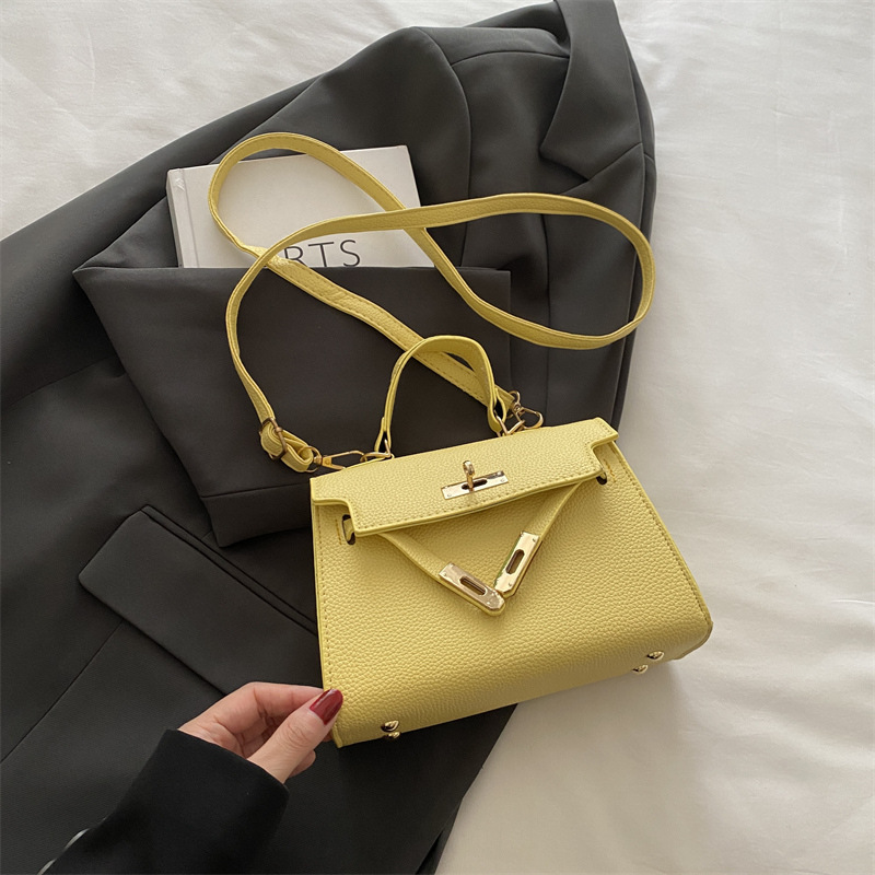 Nicho de alta sensación simple bolso de mano mujer 2024 nueva moda versátil bolso Kylie de moda bolso pequeño
