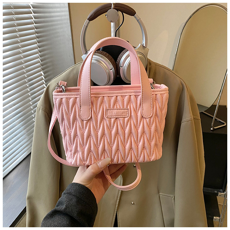 Coreano simple bolso de mano plegable de color sólido bordado de estilo extranjero bolso de hombro para hombres y mujeres nuevos accesorios para niños transfronterizos