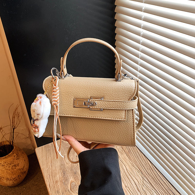 Diseño nicho bolso de mano mujer 2026 nueva moda mochila de hombro simple viento bolso de viaje diario