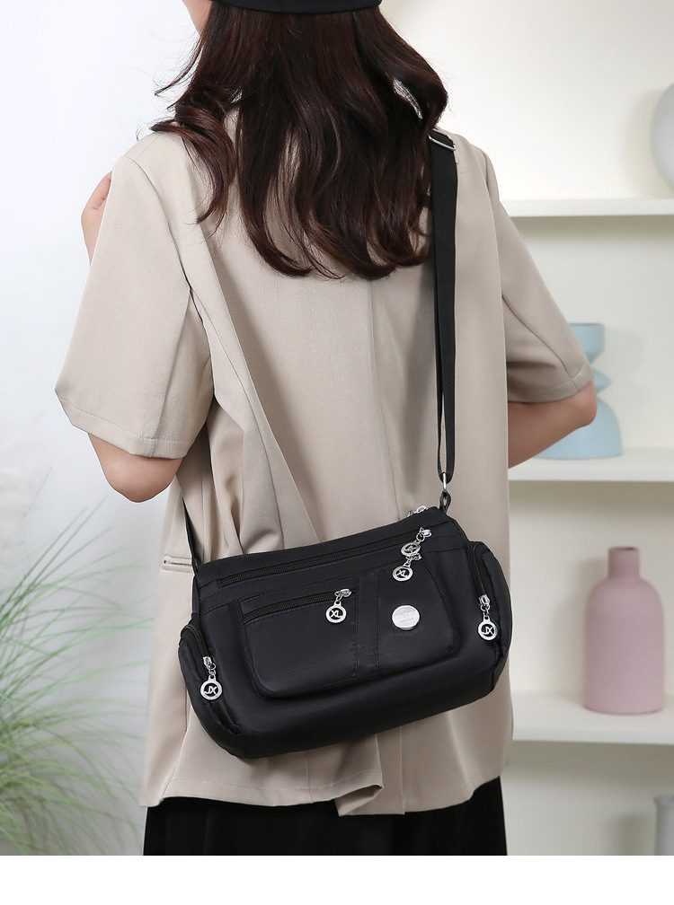 A new popular women's crossbody bag with multiple layers made of Oxford fabric, fashionable, casual and trendy. It's a single-shoulder bag for middle-aged and elderly mothers undefined