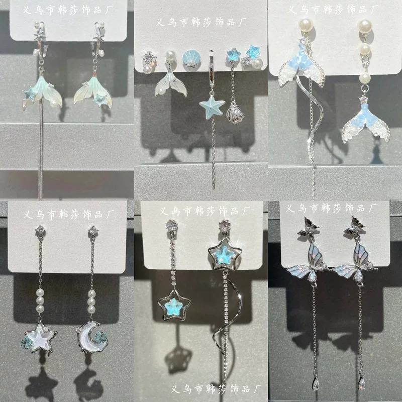 Asymmetrical earrings, brand ear clips