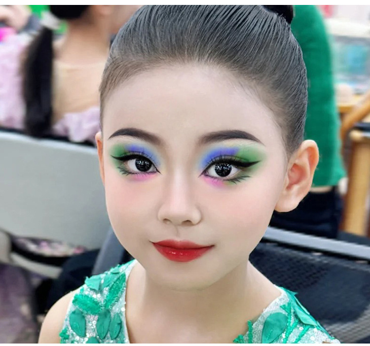 The student stage makeup with colorful eyeshadow, featuring a special blue, green, purple and pearlescent eyeshadow palette, showcases a dazzling performance of makeup undefined