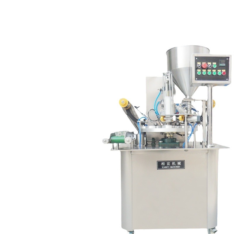 酸奶炼乳杯灌装机 自动勺子封口设备 蜂蜜勺子旋转式灌装封口机