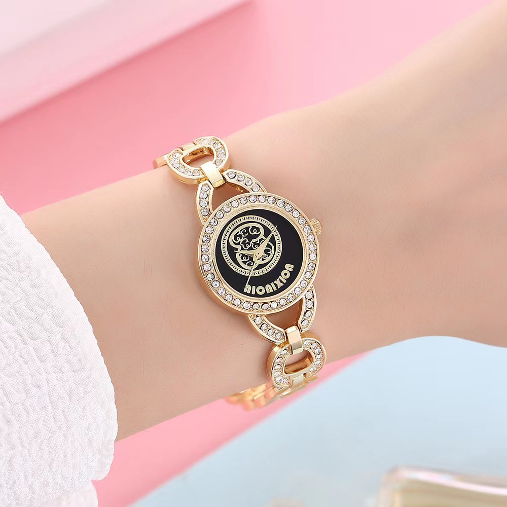 Selezionato orologio da polso versatile in oro di vendita caldo per donna con intarsio di diamanti Orologio da polso squisito di marca Orologio da studentessa con orsetto carino_voghion.com