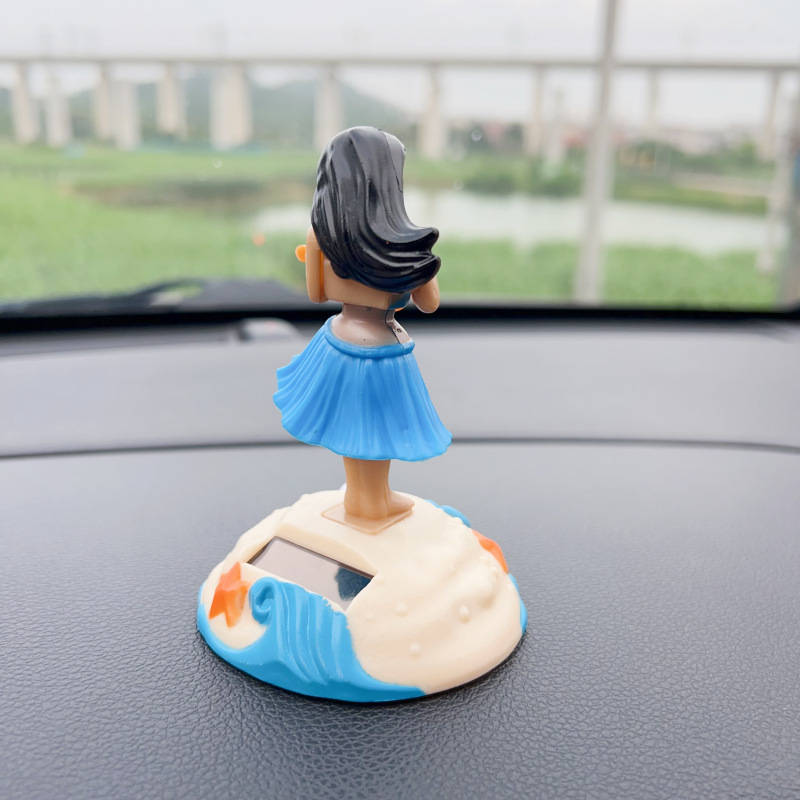 Transfronterizo Hawaii creativo swing falda de paja sacudiendo la cabeza muñeca adornos de coche adornos de dibujos animados regalos juguetes para niños