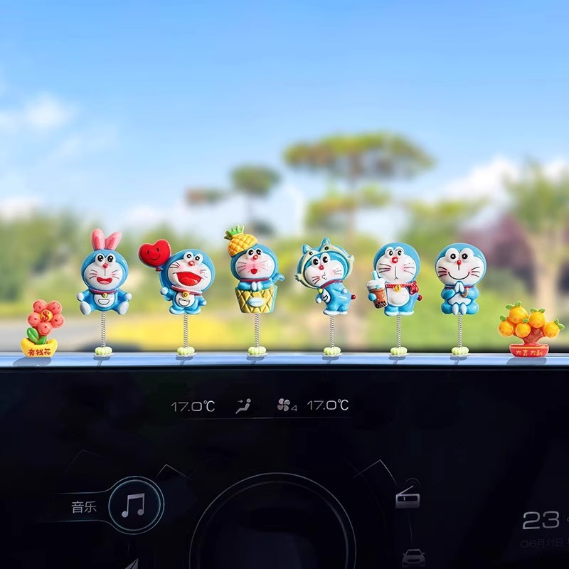 Nuevo lindo Doraemon decoración de coche creativo consola central de coche decoración de espejo retrovisor eléctrico interior