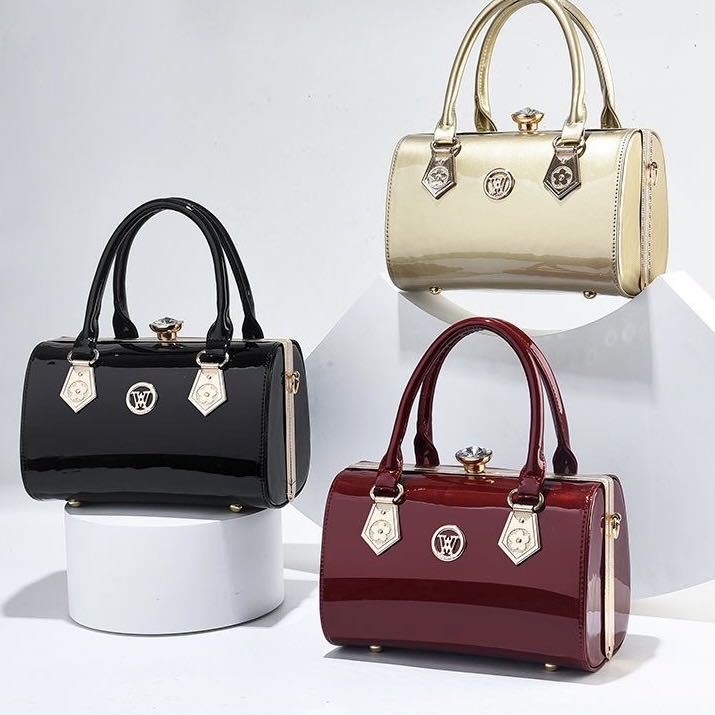 Bolso de mujer nuevo bolso de mujer de estilo europeo y americano de moda abrazadera de acero de cuero brillante bolso de brazo oblicuo bolso de textura de hombro de mujer