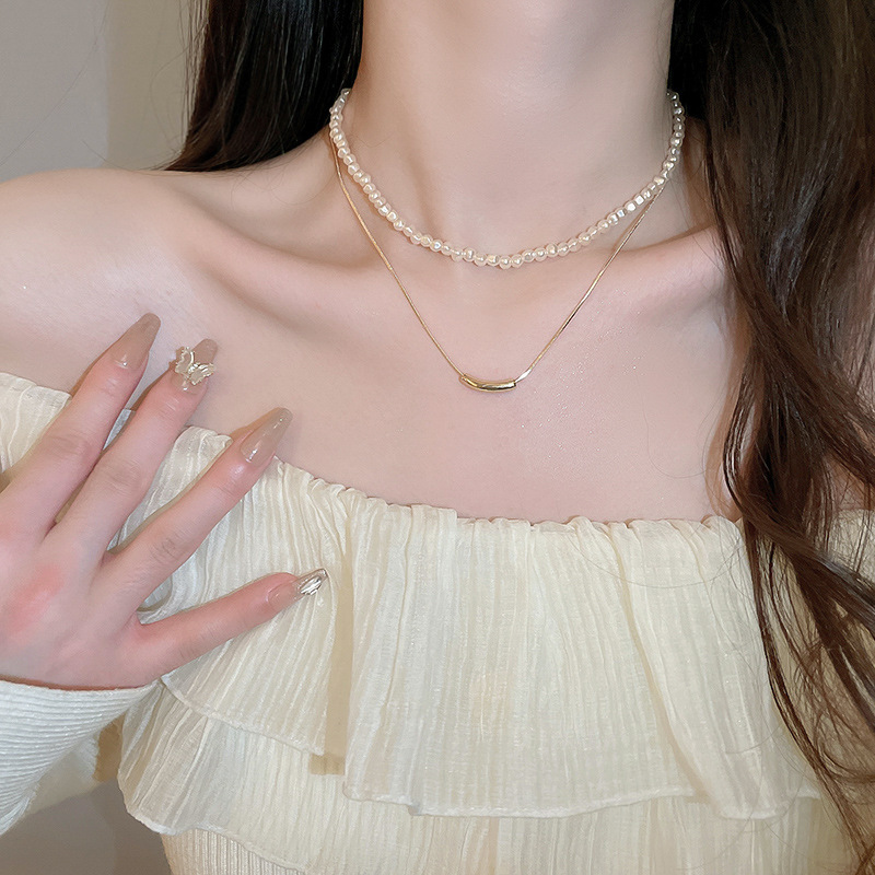 Collar de perlas con lazo de flor con cuentas francesas Elegante cadena de clavícula con sentido de alta gama retro ligero decoración de lujo femenino