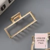 Golden, rectangular, small
