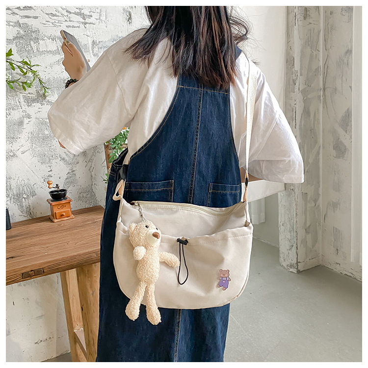 The new 2022 Little Bear canvas small bag for women is simple and versatile. The student dumpling bag is a trendy casual single-shoulder crossbody bag undefined