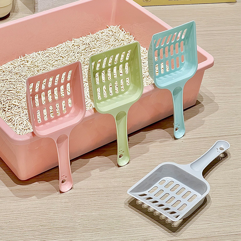 Fábrica de pala de arena para gatos venta directa de plástico para gatos limpio y simple para decollar el inodoro de malla hueca para gatos al por mayor