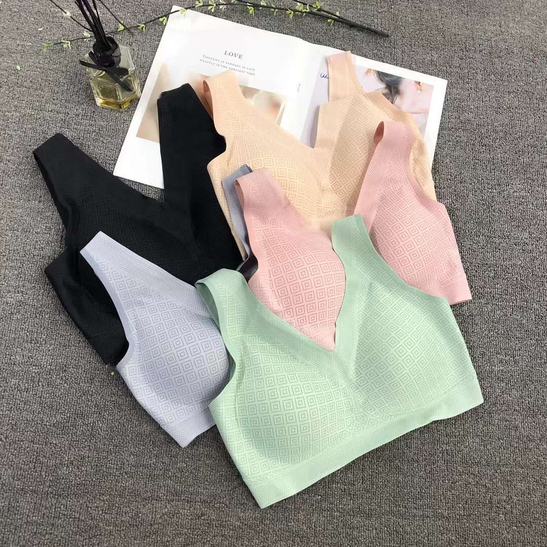 Nueva ropa interior deportiva de color sólido de las mujeres pequeño pecho push up pecho grande pequeño sujetador inalámbrico adhesivo sin costuras Sujetador deportivo