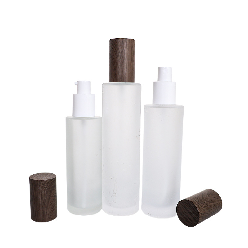 Botella de cosméticos de madera oscura botella de crema de vidrio gruesa botella de emulsión sellada botella de crema frita botella vacía