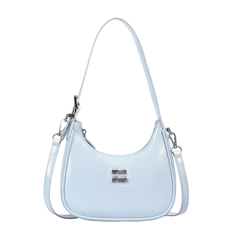 Bolsos de mujer al por mayor, nueva tendencia, bolsos de hombro de moda de alta gama, color sólido, dulce y fresco, bolso de bola de masa de mensajero con estampado brillante